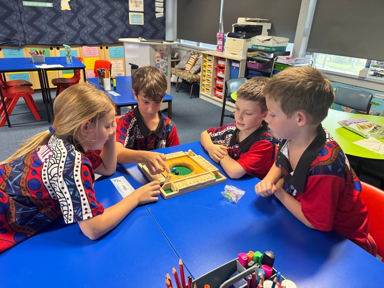 Students in class doing maths activities